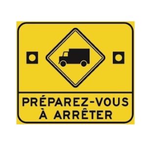 Préparez-vous à arrêter à un passage pour camions