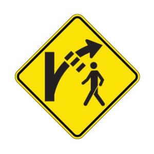 Signal avancé de passage pour piétons dans un îlot déviateur